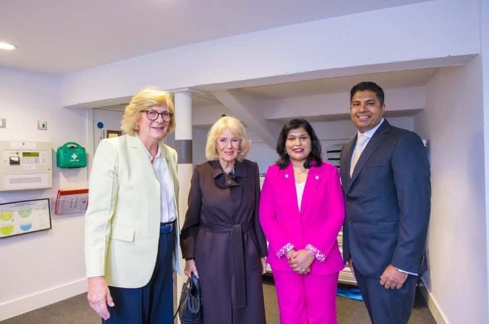 Lady Lansdowne, Her Majesty The Queen, Dr Monica Devendran and Mr Prem Kumar standing together at Marlborough College